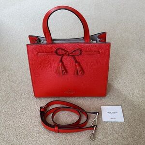Kate Spade orange small Satchel with Tassel Accents